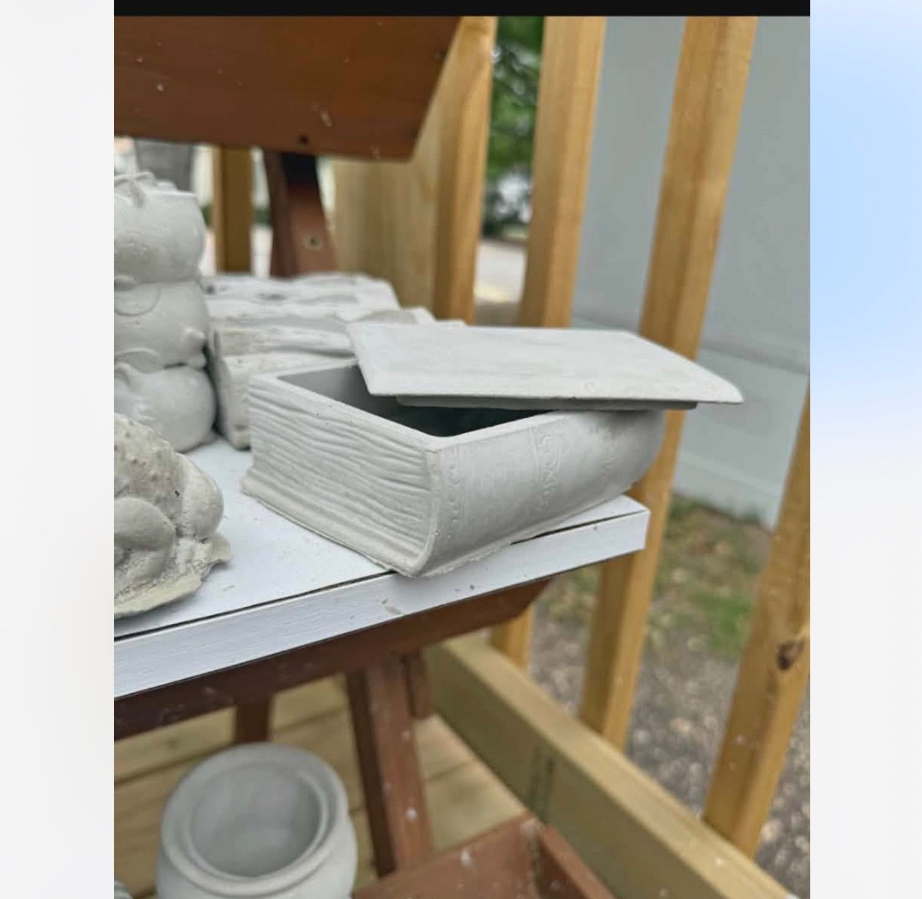 Book shaped hidden storage or keepsake box made from cement