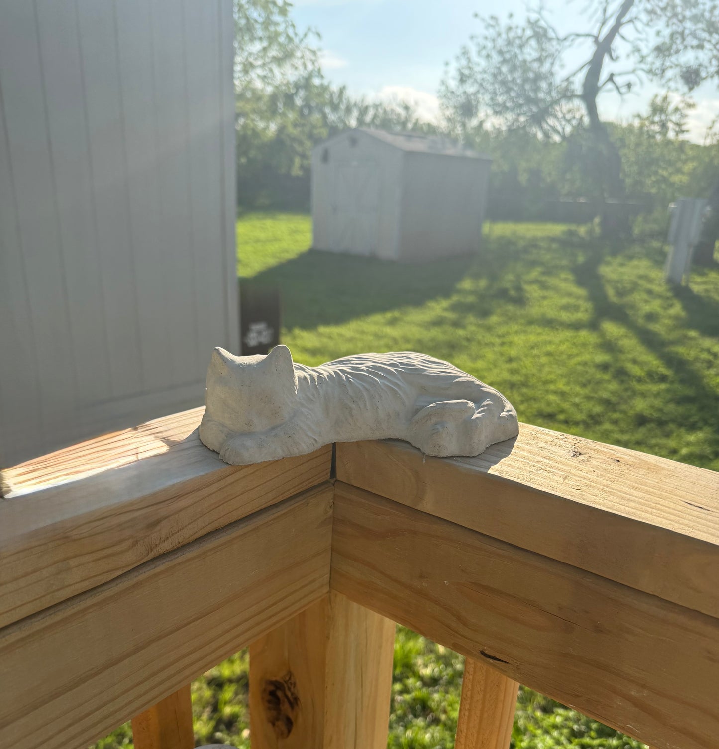 Sleeping cat statue